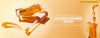 Lip Oil Shimmer open with an applicator in a yellow background