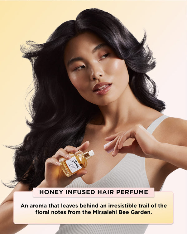 Model Holding Honey Infused Hair Perfume